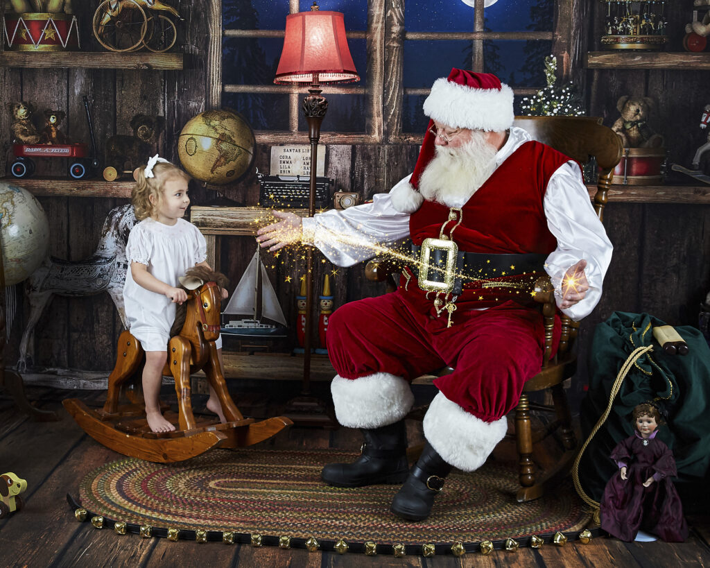 Santa with Young Girl on Rocking Horse